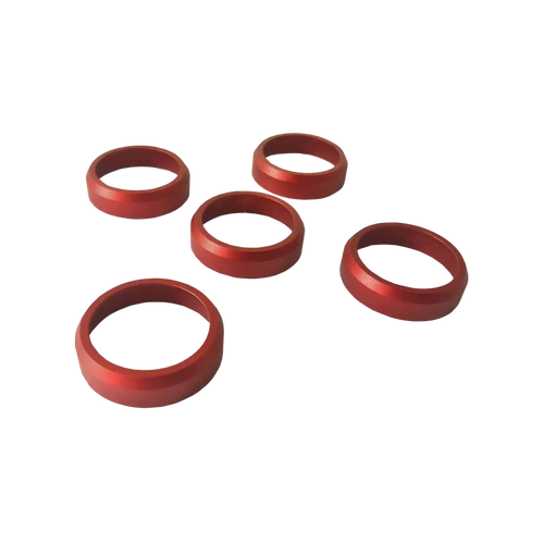 Five red anodized aluminum anti-crack rings for duck call barrels
