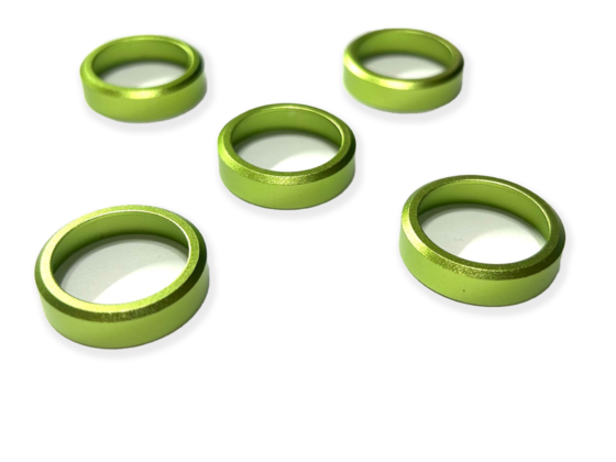 Lime crack rings for duck call. these fit all Kirk McCullough duck calls. A perfect addition to your excellent duck calls and help them be effective all duck hunting season long. Aluminum Anodized, or Brass, tapered ring, fits most D-2, DJ Grafton, and other keyhole calls. The ring is applied with epoxy, preventing the barrel from cracking. These are aluminum Anodized, tapered rings, fits most D-2, DJ Grafton, and other keyhole calls. 1. Five shiny lime aluminum rings on a white surface, perfect for preventing cracks in duck call barrels. Enhance your duck calls for a successful hunting season! 2. Enhance your duck calls with these four vibrant lime aluminum rings. Prevent barrel cracks and ensure effective calls all season long. A must-have for cut-down duck calls! 3. Add a touch of style and functionality to your duck calls with these five lime aluminum rings. Prevent barrel cracks and make your calls effective throughout the entire hunting season. Perfect for all Kirk McCullough duck calls!